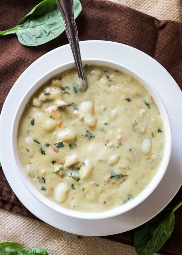 Overhead shot of Chicken Gnocchi Soup with spoon in bowl