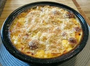 Mac and cheese removed from oven with golden breadcrumbs on top