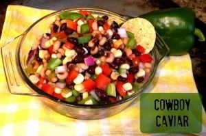 Cowboy Caviar in clear round sigh with chip sticking out of salsa