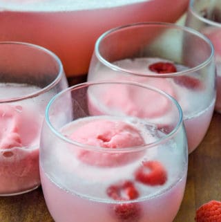 Close up of Punch in glass with raspberries