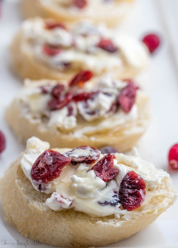 Honey Cranberry Baguette Bites on white platter 