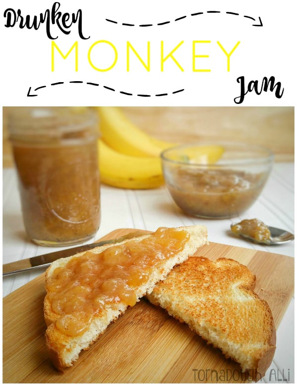 Drunken Monkey Jam spread on one slice of cut toast with jar of jam in background
