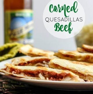 Corned Beef Quesadilla stacked on white plate