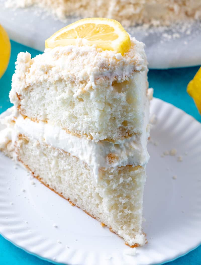 Lemon Crumb Cake on plate with bite taken out