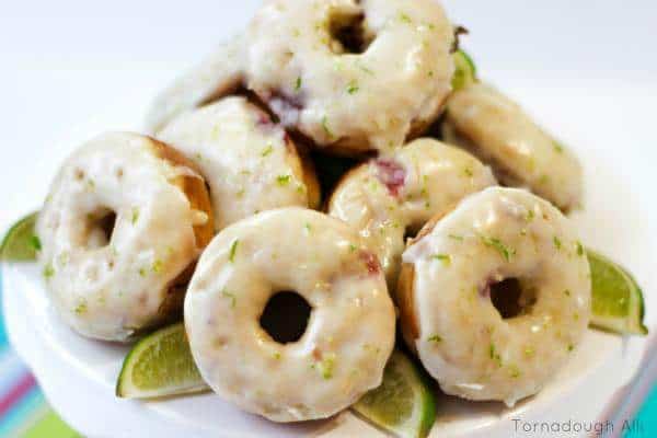 Strawberry Lime Donuts glazed and sprinkled with lime zest