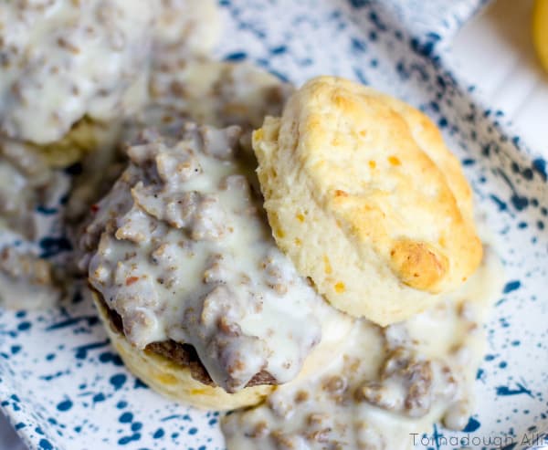 Overhead of one stacked Biscuit and Gravy