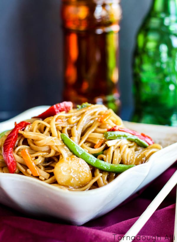 Stir Fried Mongolian Noodles in white bowl showing vegetables
