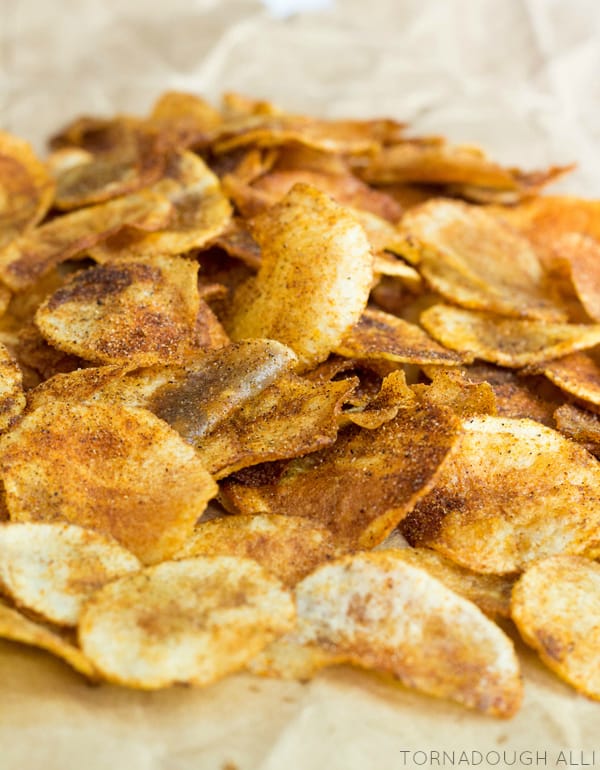 Close up of Homemade BBQ Potato Chips on parchment paper