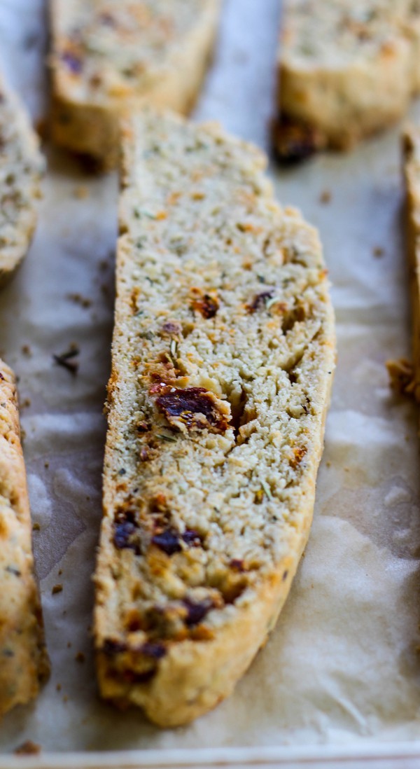 Close up piece of Sun-Dried Tomato and Herb Biscotti on baking pan