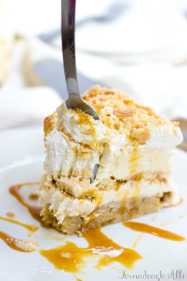 Fork poking into Banana Caramel Ice Cream Cake slice