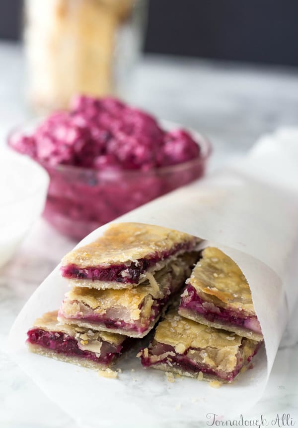 Blackberry Cream Cheese Pie Dippers in parchment paper cone