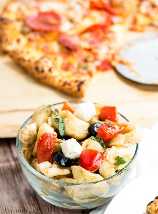 Caprese Tortellini Salad in small glass bowl