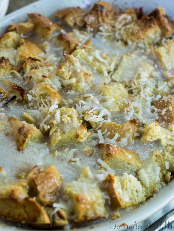 Overhead of Bread Pudding covered in sauce