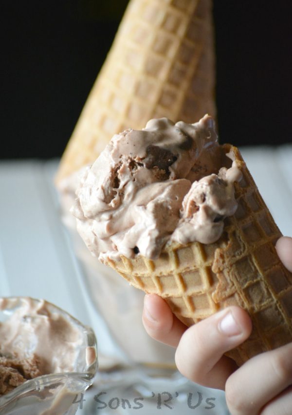 Chocolate Malt Crunch Ice Cream  in waffle cone being held
