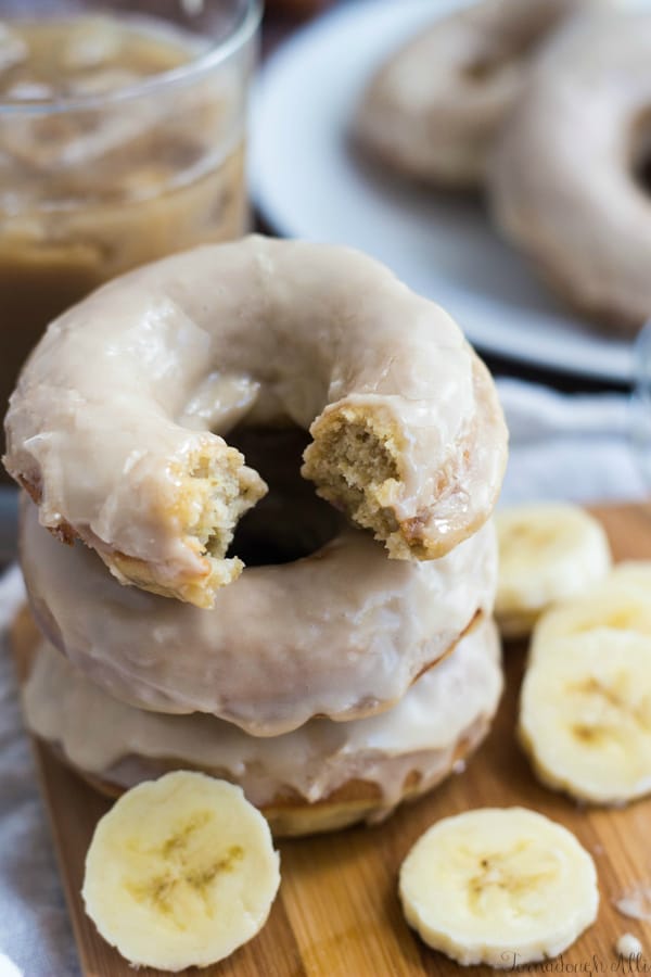 Stacked donuts with bite taken out of one