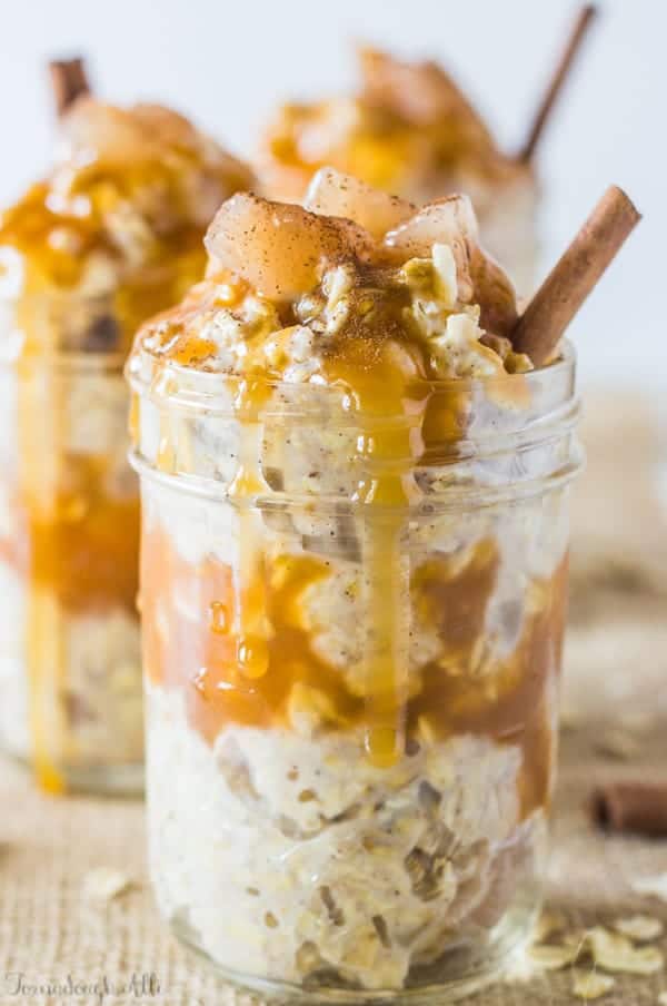 Caramel Apple Pie Overnight Oats in mason jar with caramel dripping down side