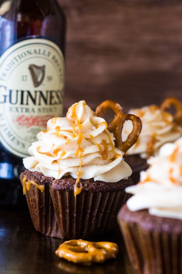 Chocolate Stout Pub Cupcakes next to a bottle of Guinness beer