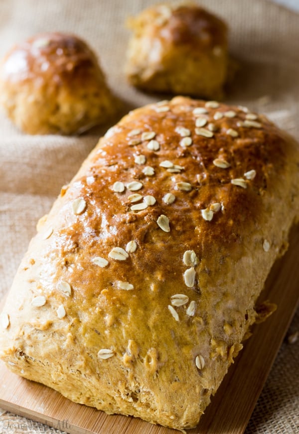 Loaf of Oatmeal Molasses Bread on wooden board