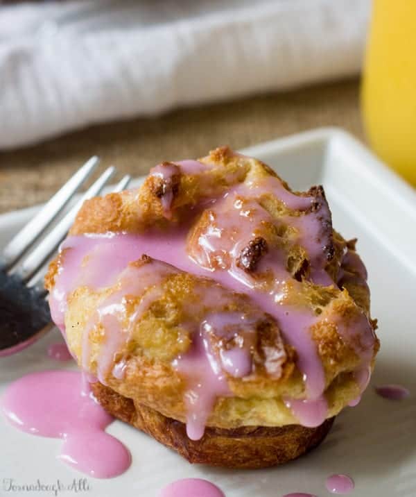 Strawberry French Toast Muffin on white plate with strawberry glaze 