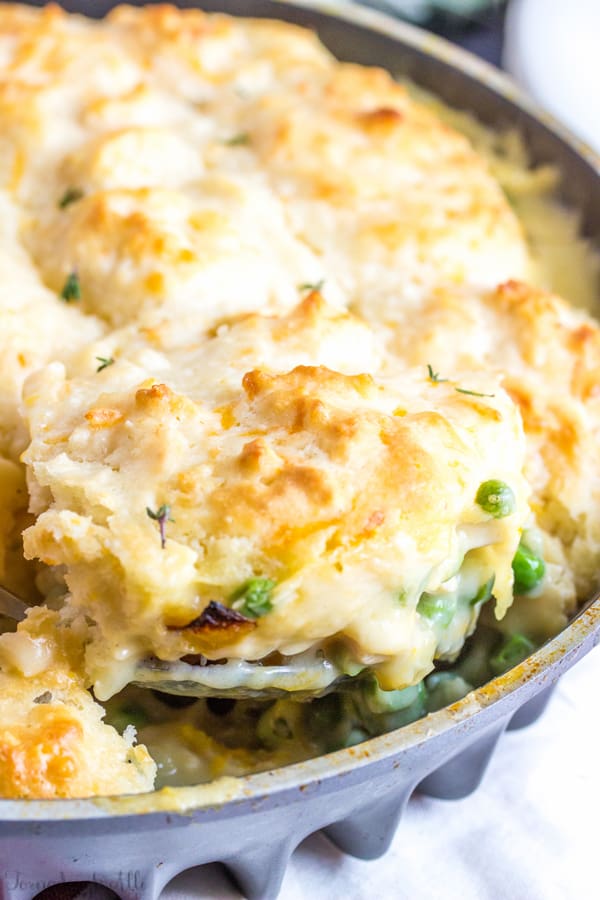 Cheddar Biscuit Topped Harvest Chicken Pot Pie being scooped up with spoon