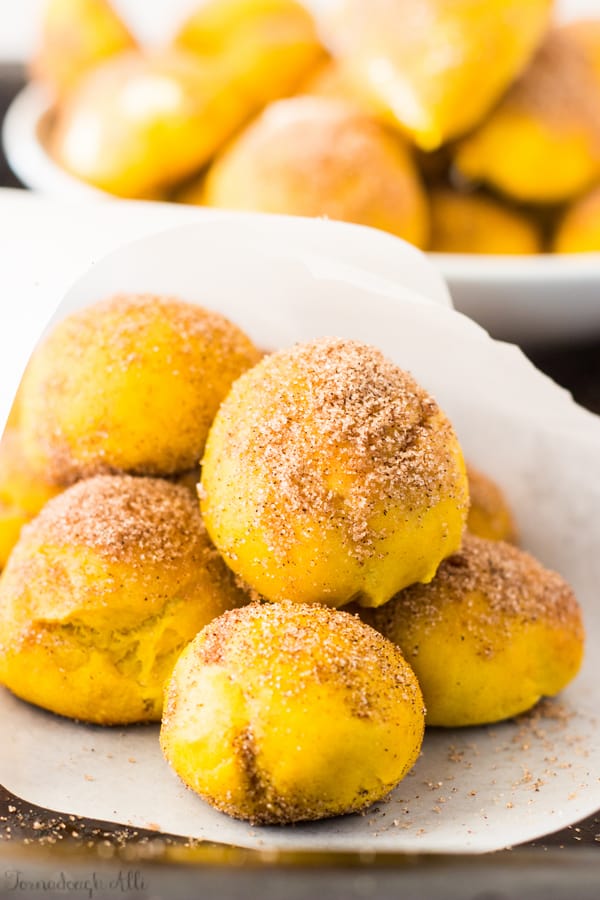 Parchment paper wrapped around Cinnamon Sugar Pumpkin Pretzel Bites