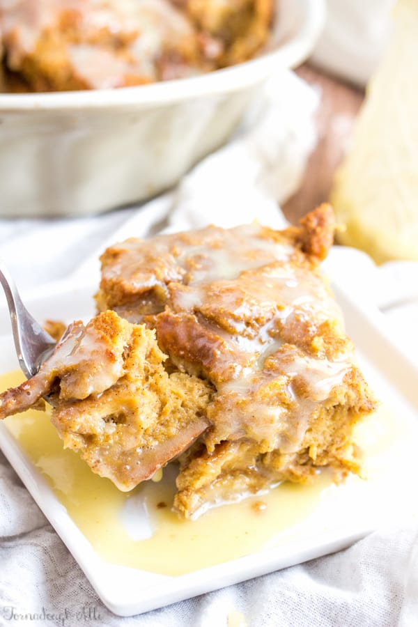 Fork taking a bite out of Gingerbread Bread Pudding