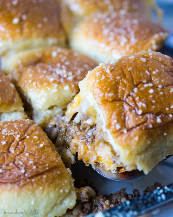 Old Fashioned Sloppy Joe Slider being pulled out of pan by server