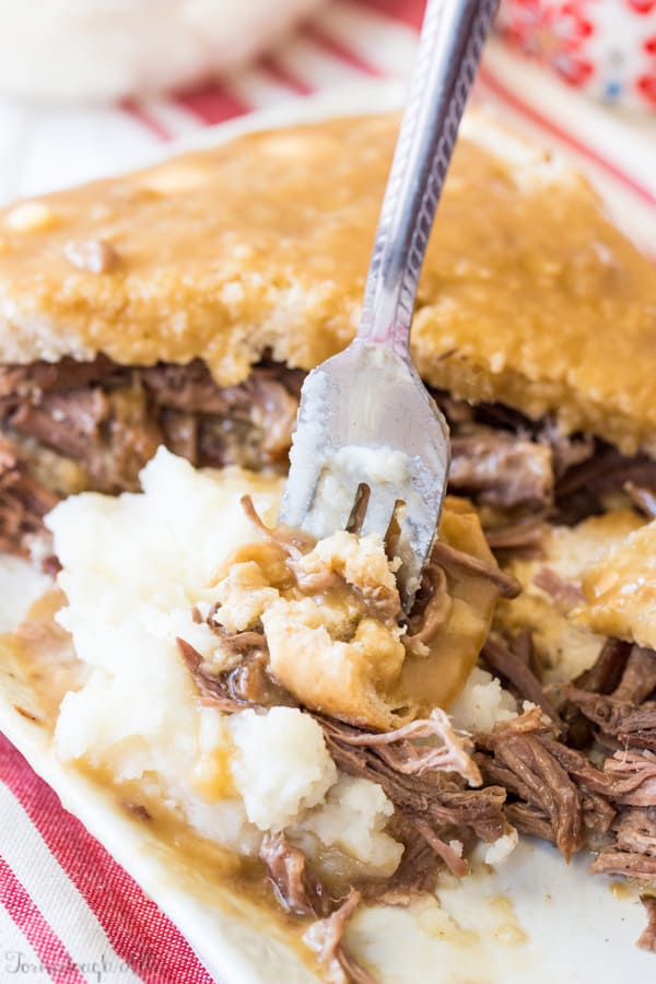 Roast Beef Commercial cut with fork dipping into mashed potatoes