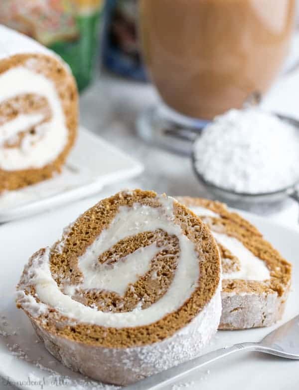 Two slices of Gingerbread Roll on white plate