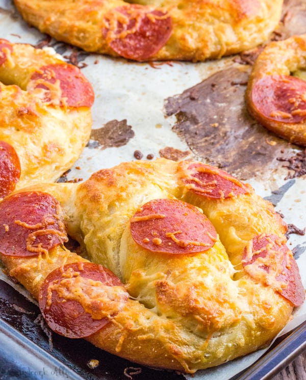 Pepperoni Pizza Pretzels on baking sheet