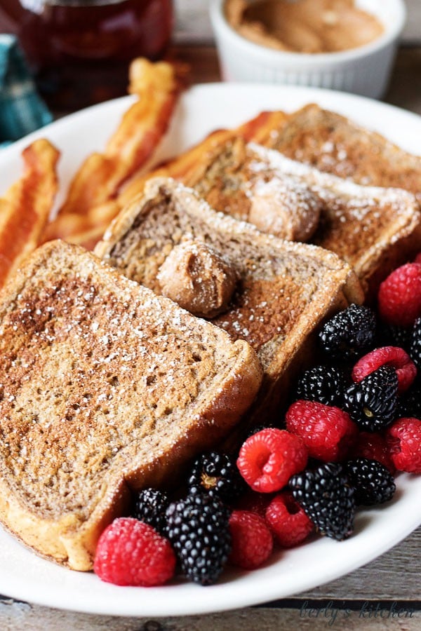 This French toast with cinnamon and brown sugar butter recipe is not your average breakfast! It’s loaded with sweet spices and decadent flavored butter.