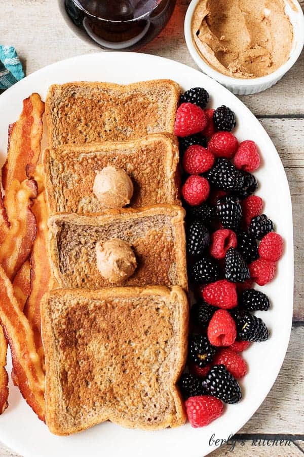 This French toast with cinnamon and brown sugar butter recipe is not your average breakfast! It’s loaded with sweet spices and decadent flavored butter.