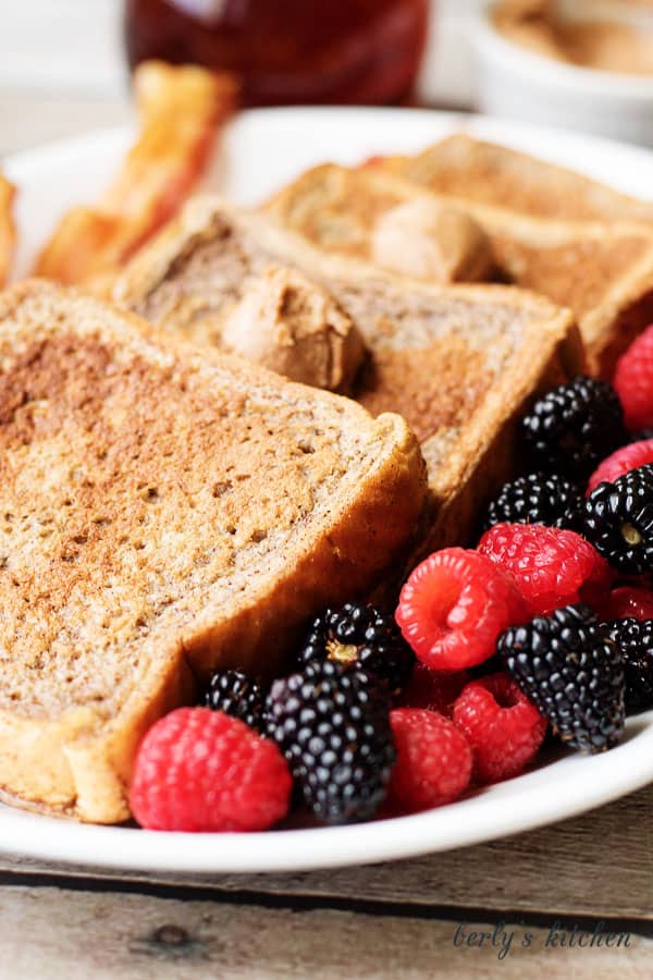 This French toast with cinnamon and brown sugar butter recipe is not your average breakfast! It’s loaded with sweet spices and decadent flavored butter.