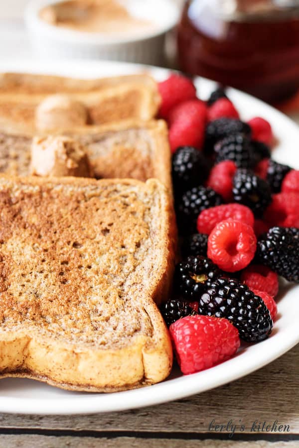 This French toast with cinnamon and brown sugar butter recipe is not your average breakfast! It’s loaded with sweet spices and decadent flavored butter.