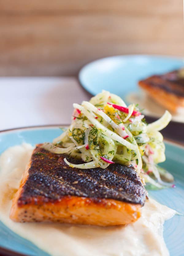 Grilling is a summer staple activity. Cooking this easy grilled salmon dish is simple and delicious, especially with a silky smooth corn puree and a crisp, but light, fennel salad.