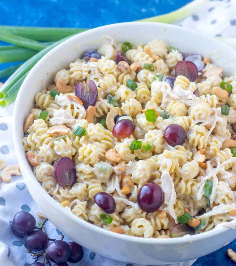 Cold Chicken Pasta Salad in serving bowl with grapes