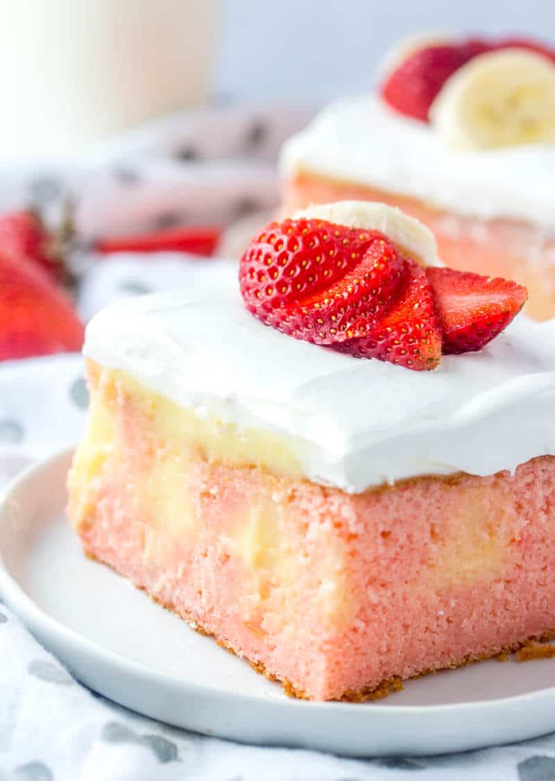 Strawberry Banana Poke Cake {A Fun Flavorful Summertime Dessert}