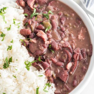 Overhead photo of red beans and rice in white bowl