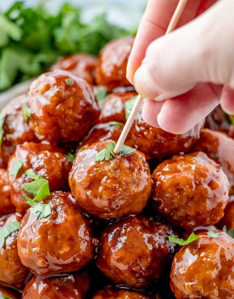 Honey BBQ Crockpot Meatballs with toothpick insterted
