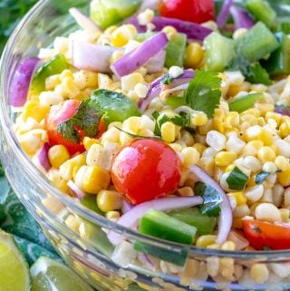Corn salad in bowl close up with vegetables