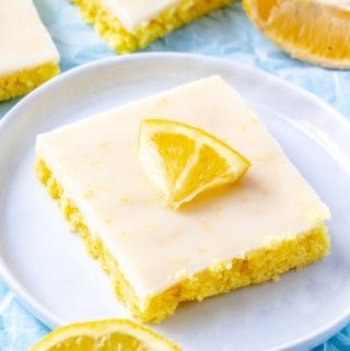 Lemon Square on plate glazed with wedge of lemon on top
