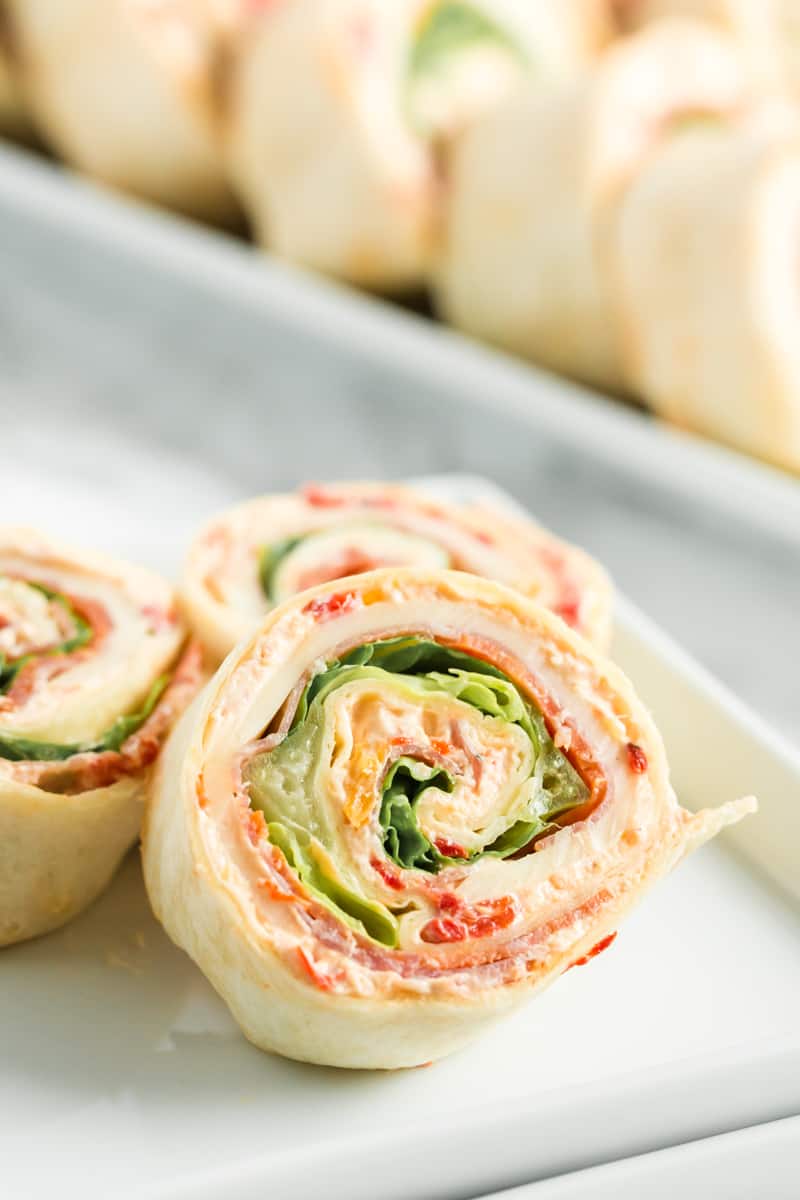 three pinwheels stacked on plate at an angle