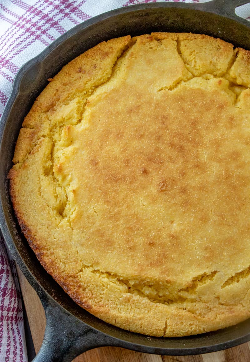 Overhead photo of finished cornbread in cast iron skillet