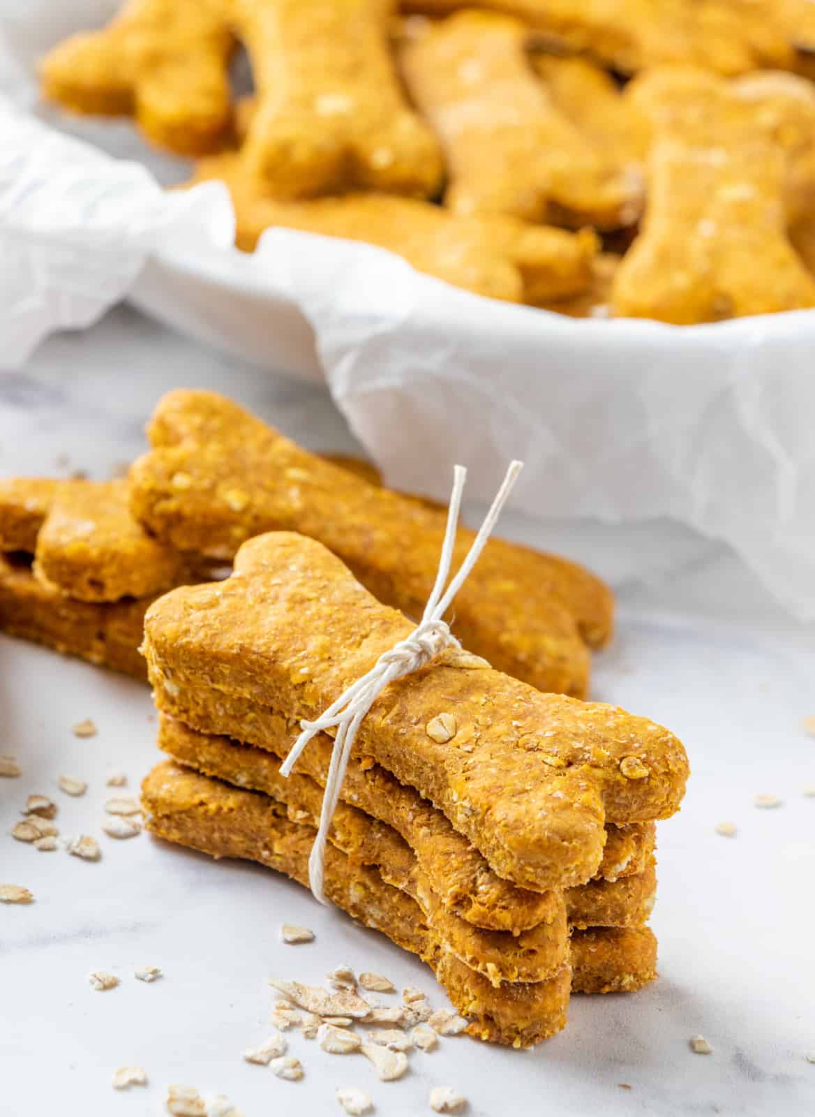 Four Homemade Dog Treats stacked and tied together with twine