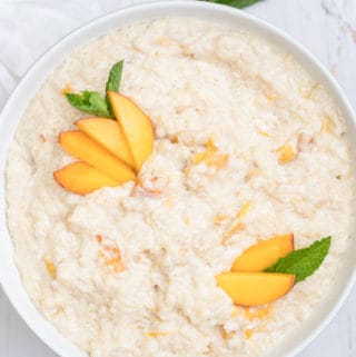 Overhead of Rice Pudding with sliced peaches
