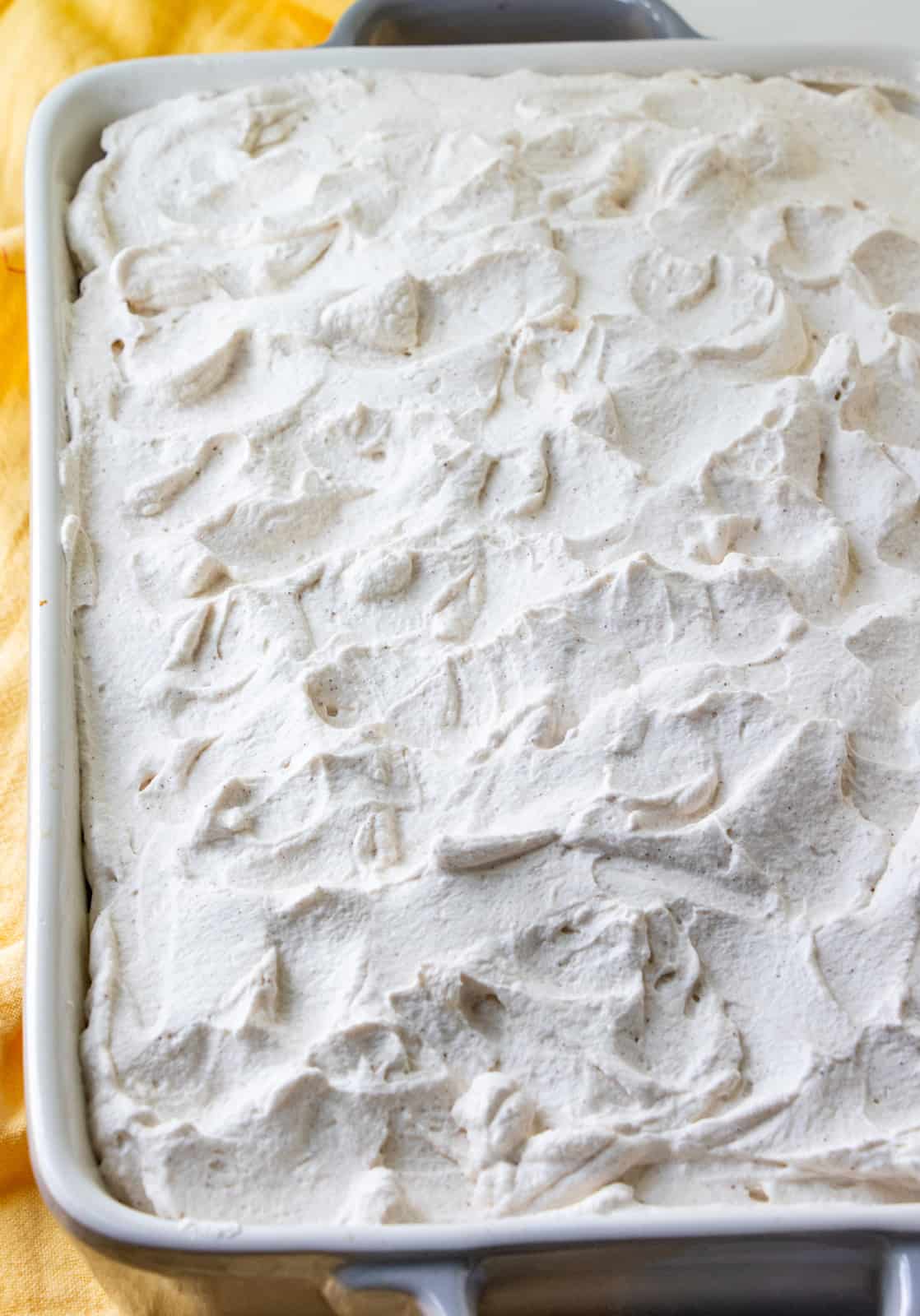 Frosted Peach Cake in baking pan