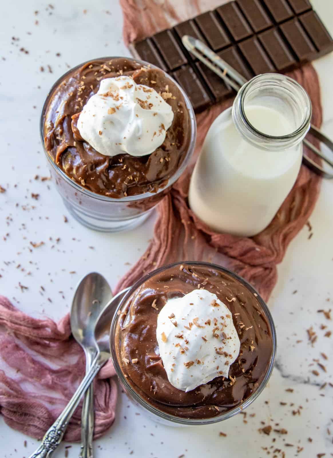 Overhead of chocolate pudding in jars