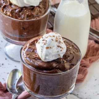 Two jars of chocolate pudding