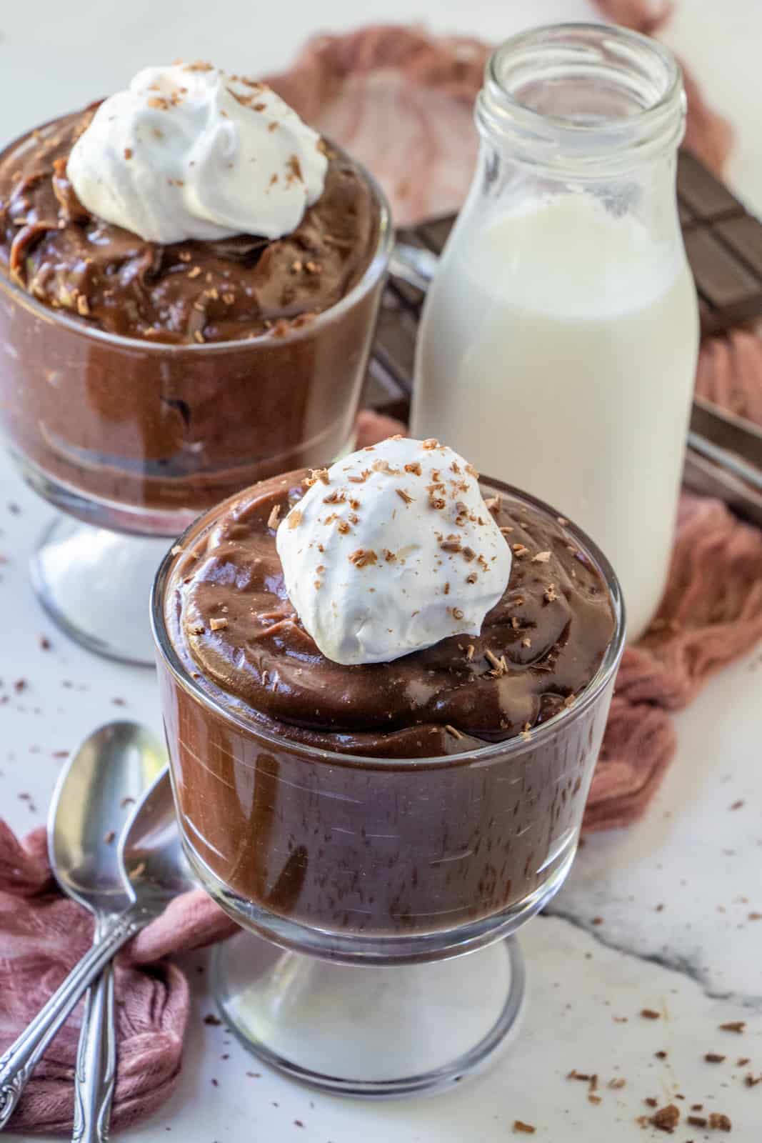 Two jars of chocolate pudding