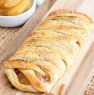 Finished Braided Apple Puff Pastry on cutting board